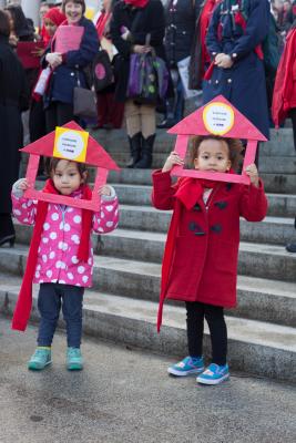 Rylie Want, 2, and Lorraine Knuston, 3, chanted on the steps of the Washington State Capitol with hundreds of others on Feb. 2.