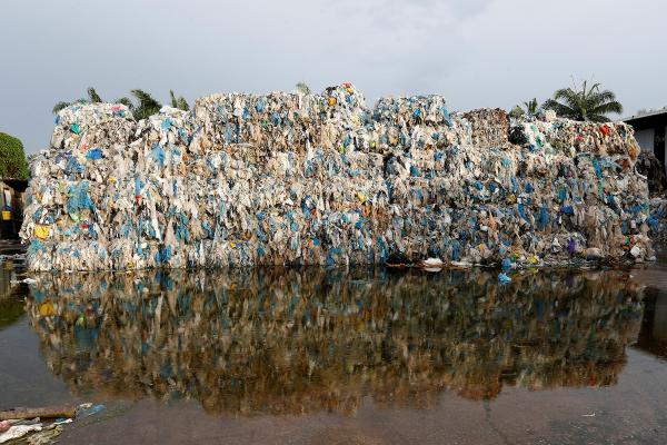 Plastic waste is piled up outside an illegal recycling factory in Jenjarom, Kuala Langat, Malaysia in October. Lai Seng Sin/REUTERS     