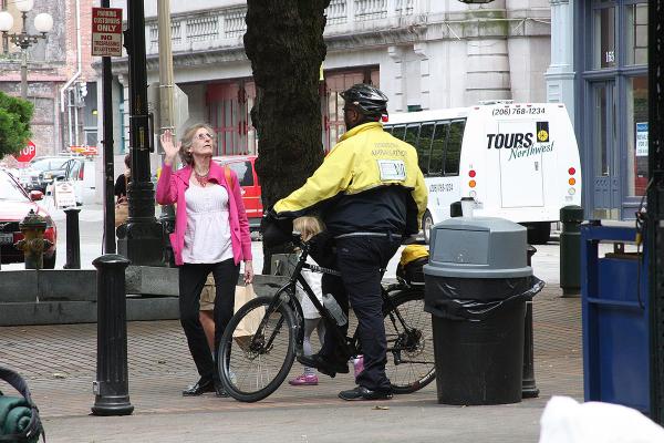 Metropolitan Improvement District patrols the downtown region, including Occidental Park in 2014. A new improvement district in Ballard will provide health services. 
