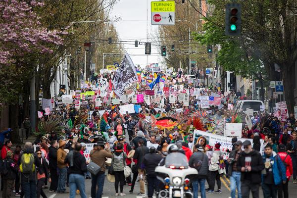 Thousands take part in the March for Workers and Immigrant Rights, which began in Judkins Park and ended at the Seattle Center. Photo by Alex Garland
