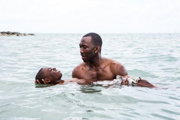 Alex Hibbert as the young Chiron with Mahershala Ali in Moonlight. Photo courtesy IMDb.
