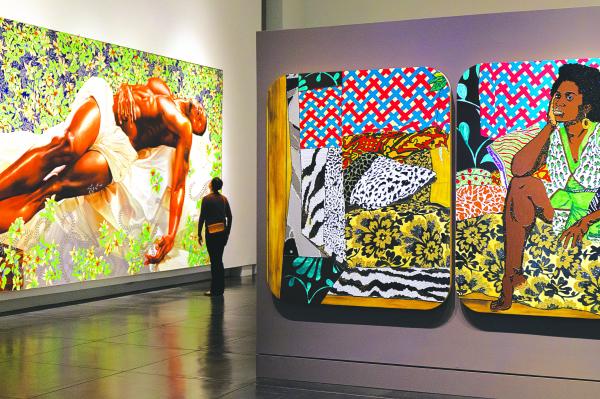 “Sleep,” Kehinde Wiley, oil on canvas 132 x 300 in., 2008 and “Baby I Am Ready Now,” Mickalene Thomas, acrylic, rhinestone and enamel on wooden panel, 72 x 132 in., 2007.