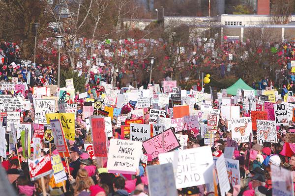 Thousands marched across Seattle during the 2017 Womxn's march. File photo by Joseph Romain