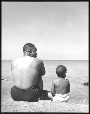 Left, Untitled photograph of father and son at Lake Michigan, 1946-1948. 