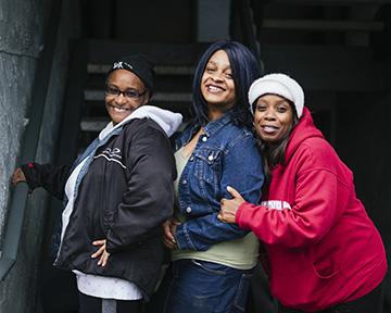 Michelle Dozier, Toya Thomas & E.J. James and their families face eviction from their apartments because the management at Renton Woods Apartments no longer wants to accept Section 8 vouchers, which cover the majority of their rent. Photo by Andrew Waits