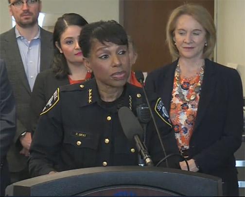 Interim Police Chief Carmen Best (center) speaks at a March 21, 2018 press conference announcing the development of legislation to address gun violence in Seattle.