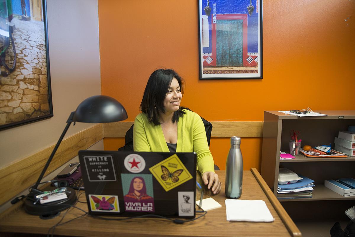 Legal advocate Norma Gonzalez works at Colectiva Legal del Pueblo’s small office in Burien, a town of 50,000 in South King County. Photo by Sarah Shannon