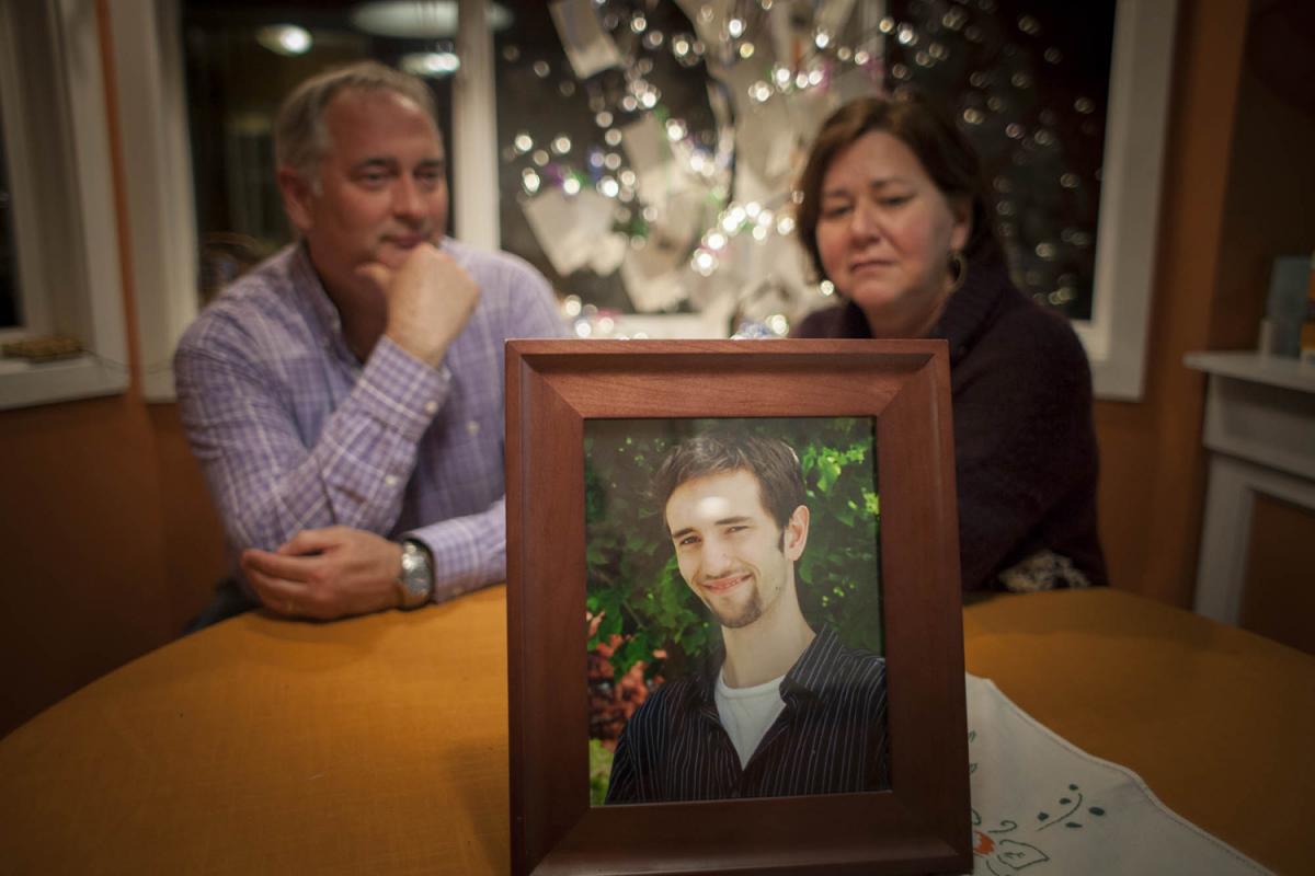 A portrait of Chad Crooks sits on a table at Todd and Laura Crooks’ West Seattle home. After Chad lost his battle with schizophrenia, his parents started Chad’s Legacy Project. Photo by Ngoc Tran