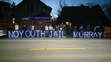 Dozens demonstrated outside of Mayor Ed Murray’s house to resist the approval of a new youth jail that King County plans to build in 2017. Photo by Ashley Archibald