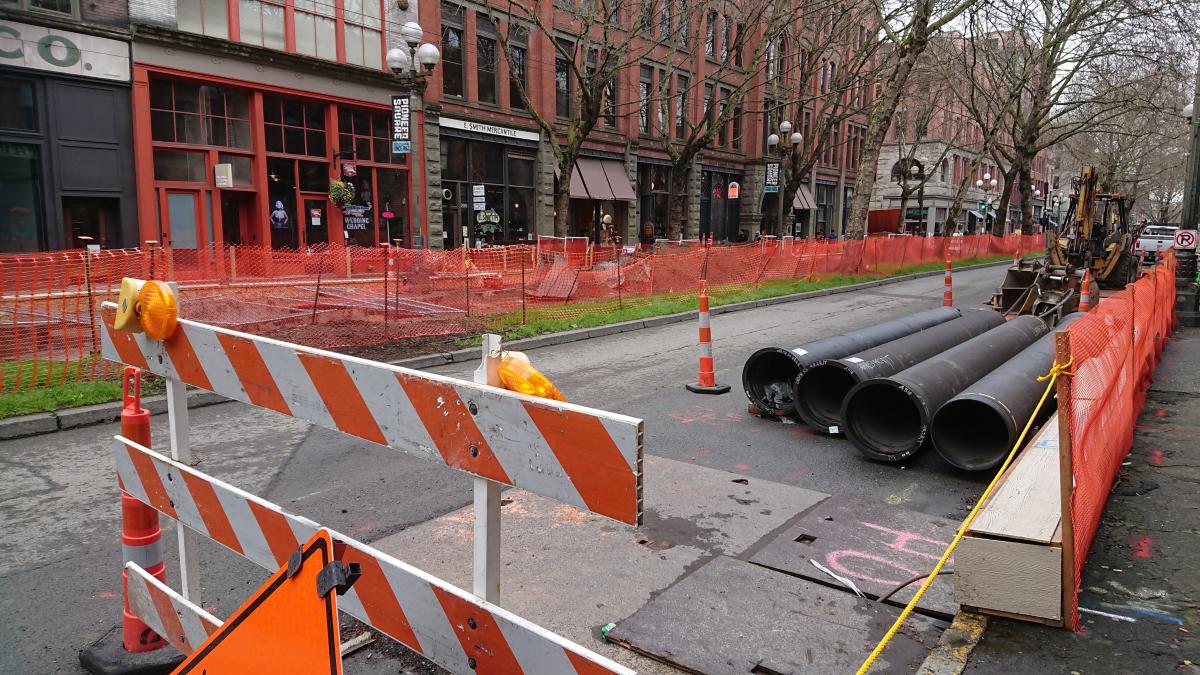 Construction on First Avenue between S. Washington and S. Main Street. Mayor Durkan placed a hold on the City Center Connector streetcar project. Photo by Lisa Edge