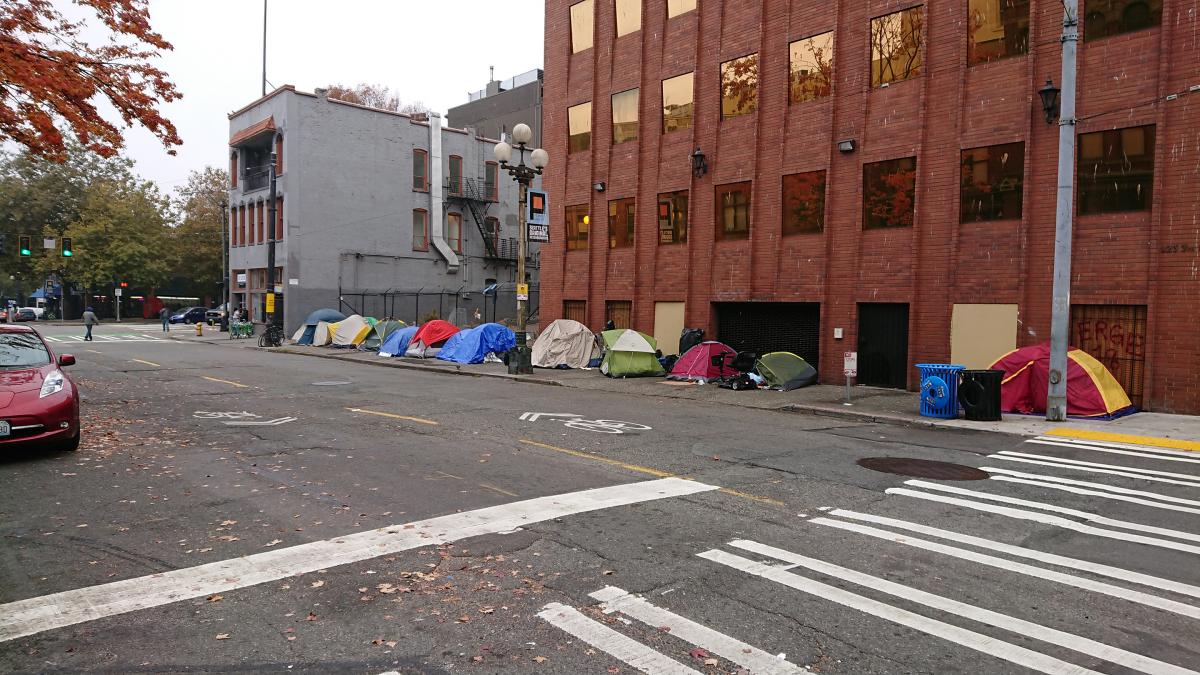 Tents line a portion of S. Washington Street in Pioneer Square. 