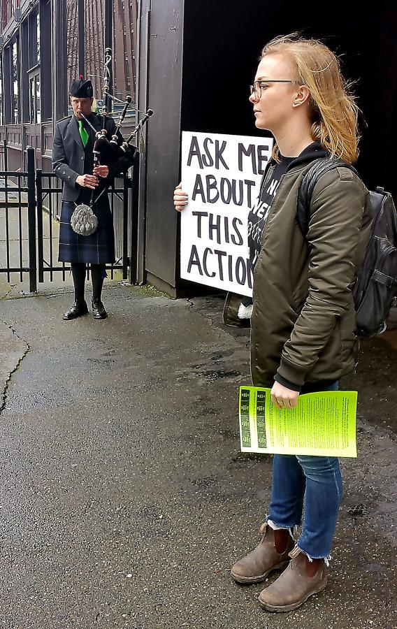 Natalie Evans protests with European Dissent outside of an event where Mayor Ed Murray was speaking to kick off Irish Week. The group is protesting the new youth detention facility. Photo by Ashley Archibald