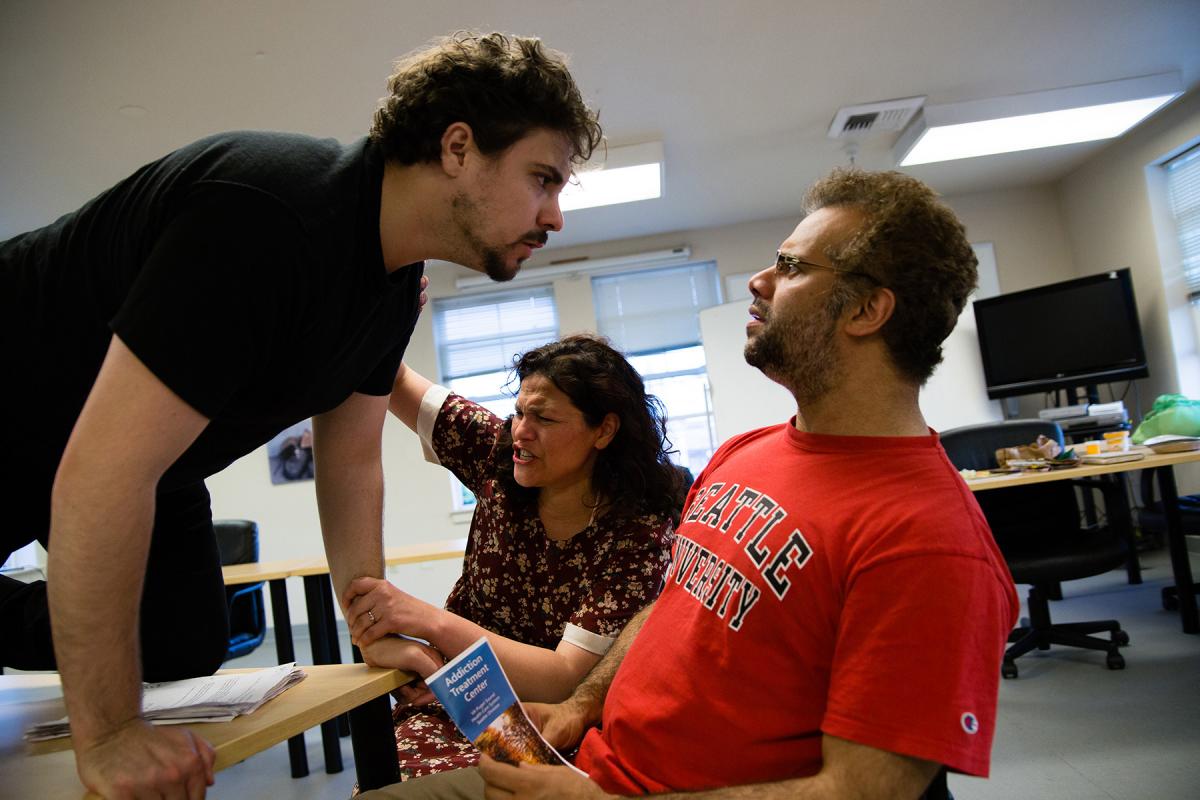 This scene from a rehearsal, shows a strain in the relationship between Lloyd (Marco Adiak Voli, left), May ( Monica Cortés Viharo, center) and Henry (Fernando Cavallo). Photo by Matthew S. Browning