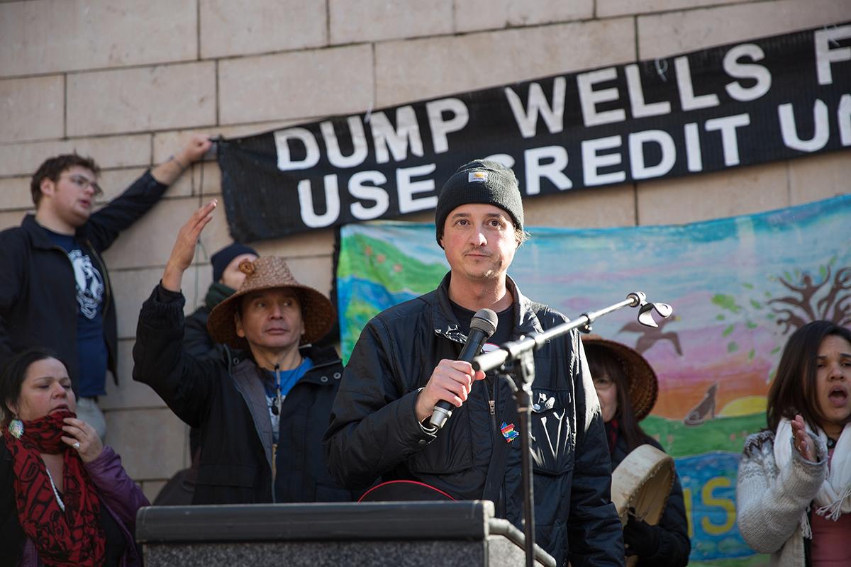 Matt Remle speaks at a divestment rally. Photos by Alex Garland