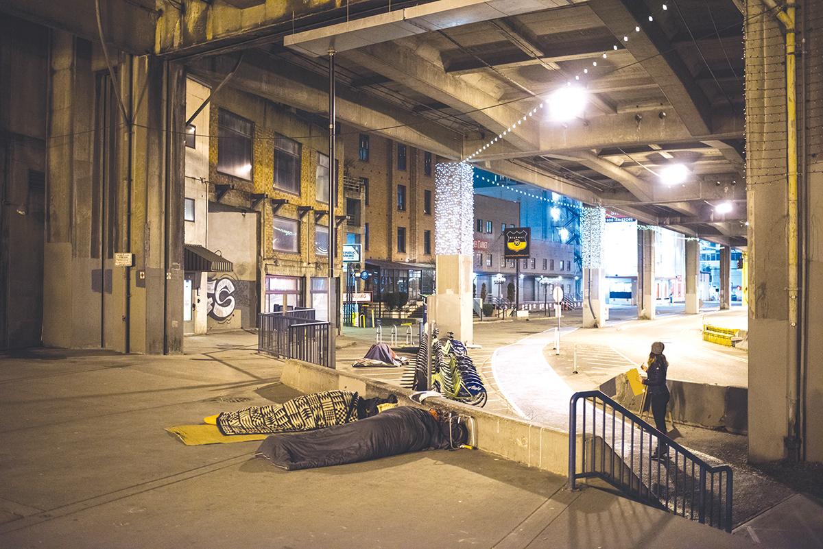 Many people in Seattle sleep without a roof over their heads every night but Seattle’s homeless population settle for a viaduct. Photo by Andrew Waits