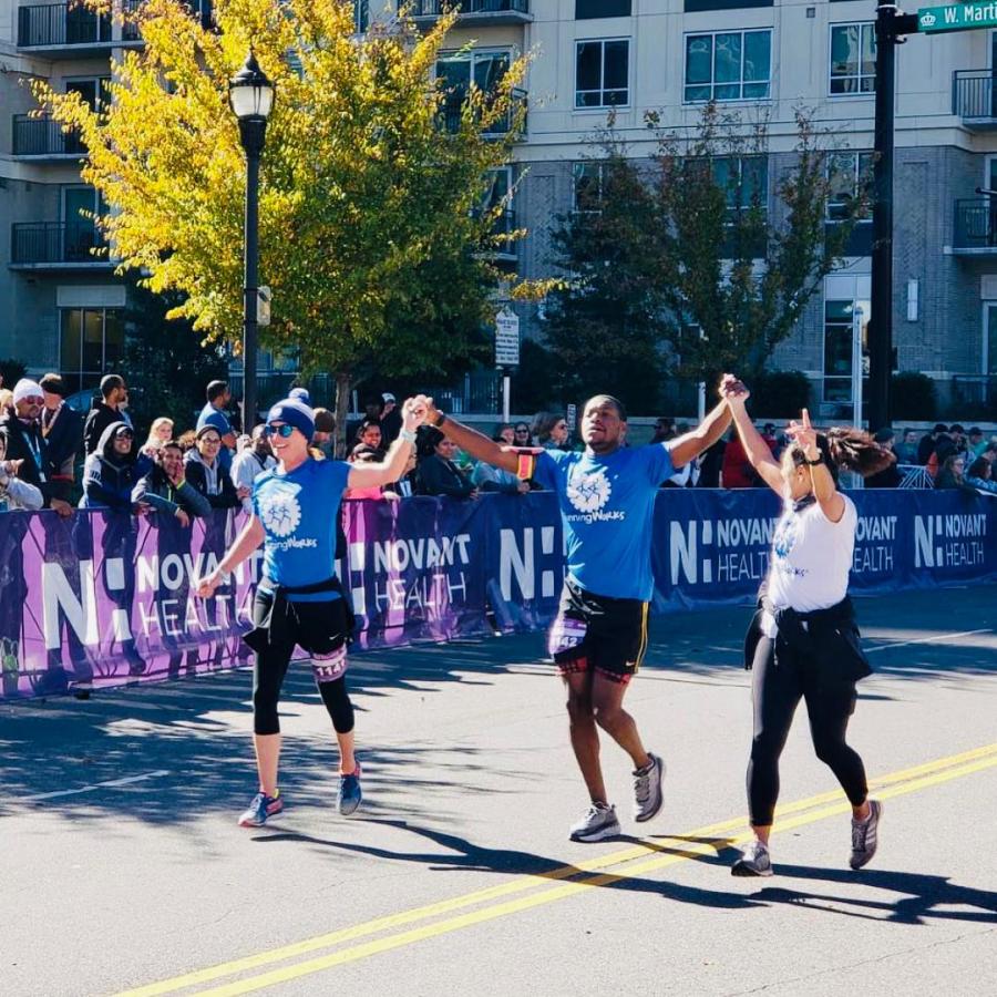 Lamarr, a member of RunningWorks, finishing his third consecutive Charlotte marathon and celebrating a personal record. Courtesy of RunningWorks