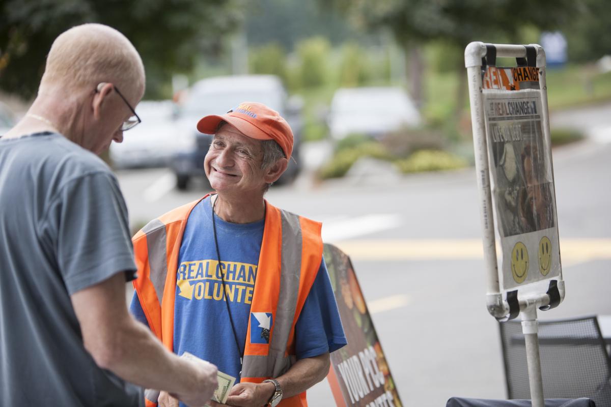 Shelly Cohen, 2016 Vendor of the Year, sells Real Change outside PCC in Bothell. 