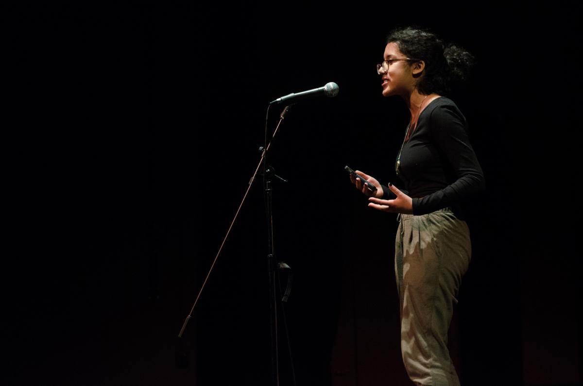 Azura Tyabji performing at Youngstown Cultural Arts Preliminary Slam in December 2015. It was her very first poetry slam, and she won, qualifying her for the 2016 Grand Slam event on April 1.
