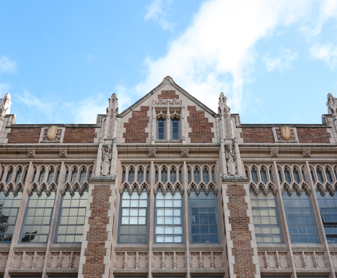 Photograph of ornate Gothic-style UW building, taken from below