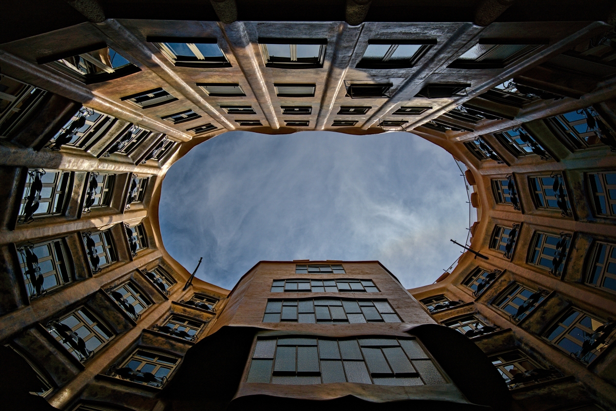 Image of multi-story circular apartment building, seen from below
