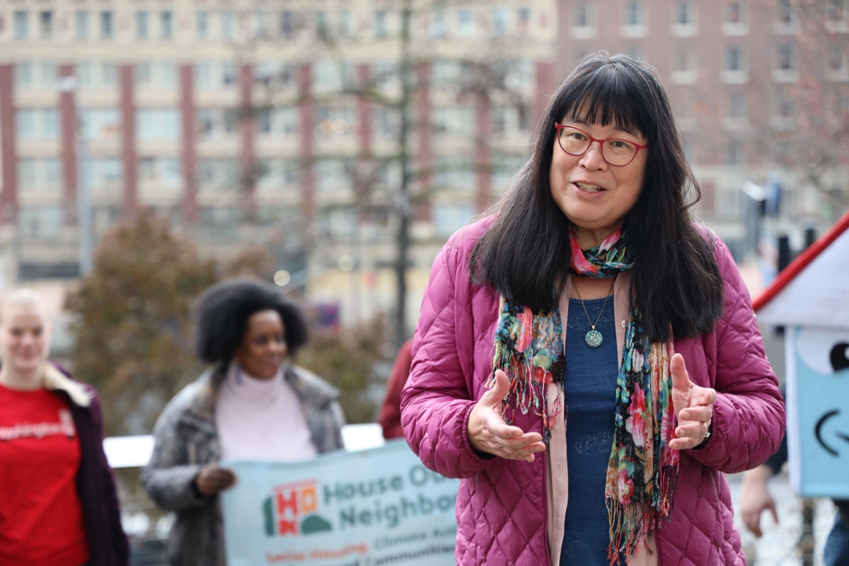 Sharon Lee, executive director of Low Income Housing Institute, speaks in support of I-137 at a press conference, Feb. 6.