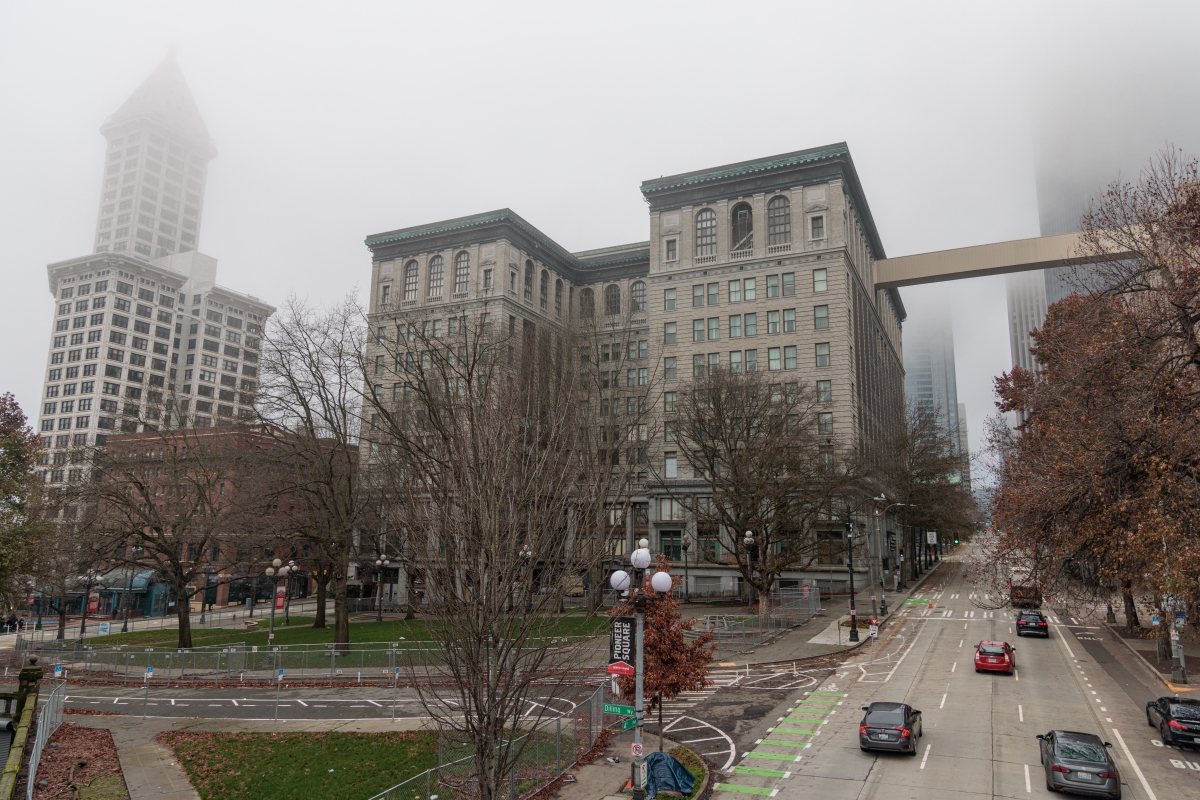 Wide-angle photo of park in Pioneer Square, Seattle on a misty gray day