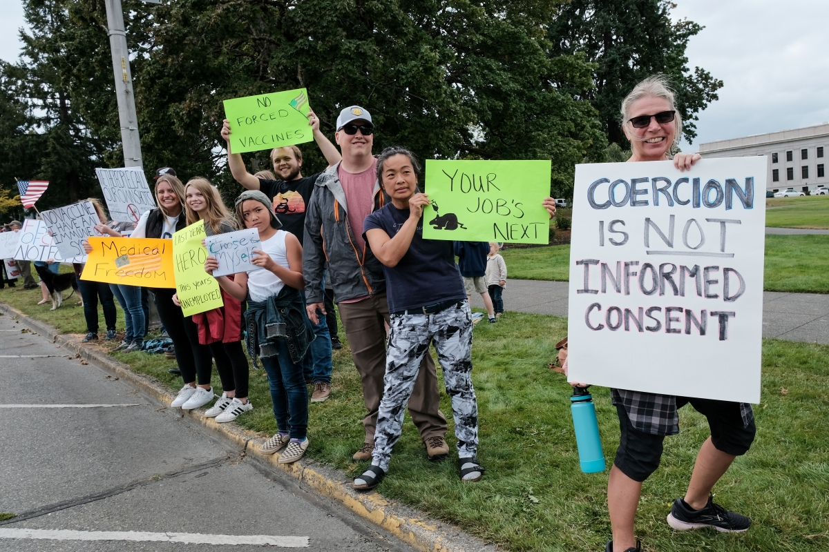 Despite Pfizer’s recent FDA approval, anti-mandate protesters in Olympia show how wary they are of COVID-19 decrees, Aug. 21. Photos by George Hickey
