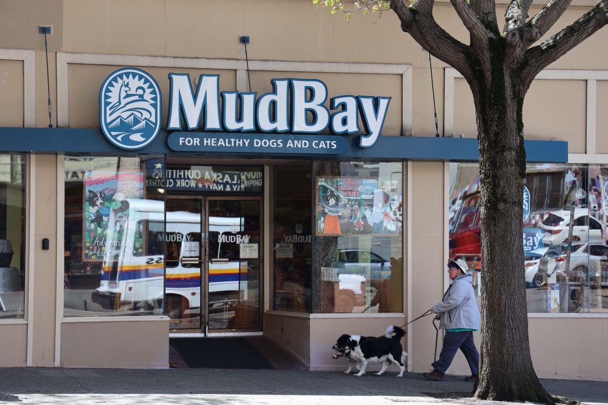 A customer enters the Mud Bay Belltown shop, April 29. Over the past year, several workers have described deteriorating working conditions at the boutique pet store chain famed for good customer service.