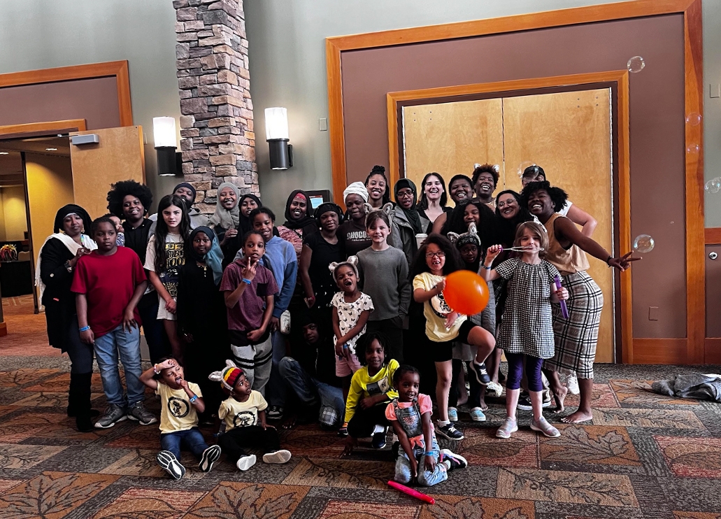 Doulas for All coalition members and families gather for a May 2023 retreat at the Great Wolf Resort in Grand Mound, Washington.