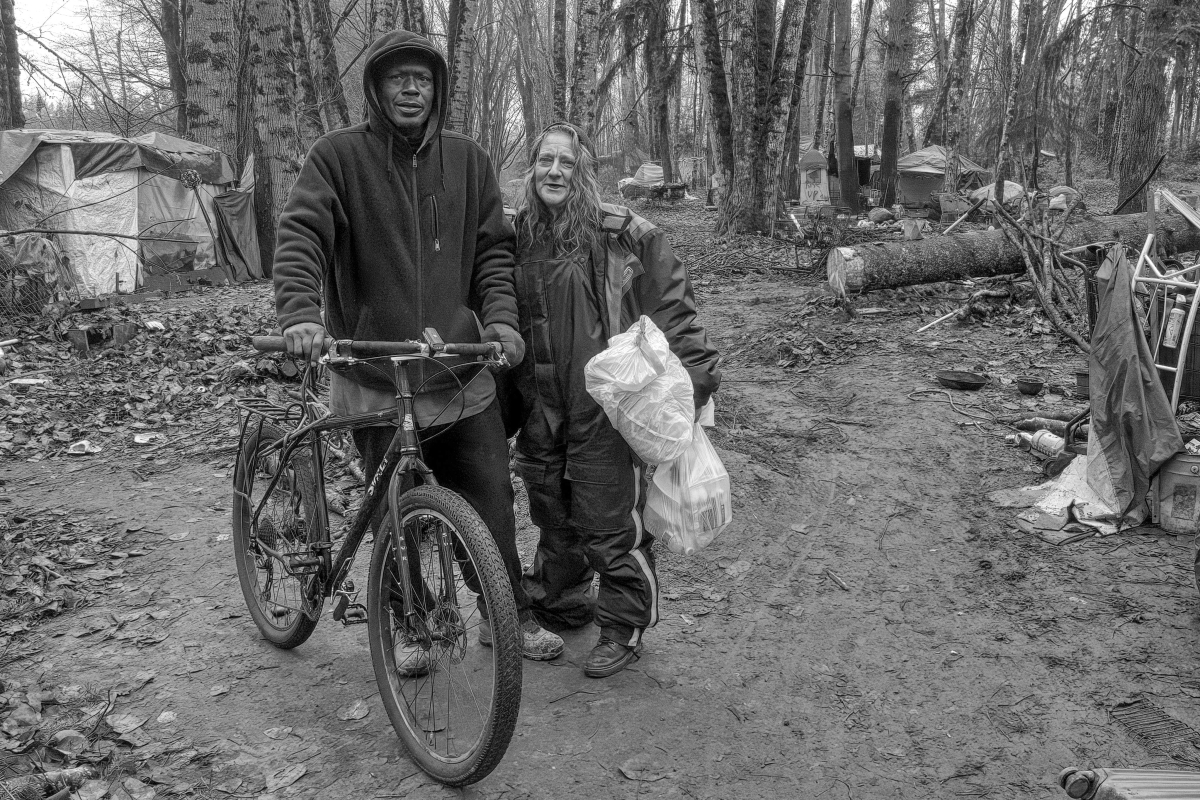 Michael and LeAnn live in an encampment in Olympia known as The Jungle. “We live one day at a time,” said LeAnn.