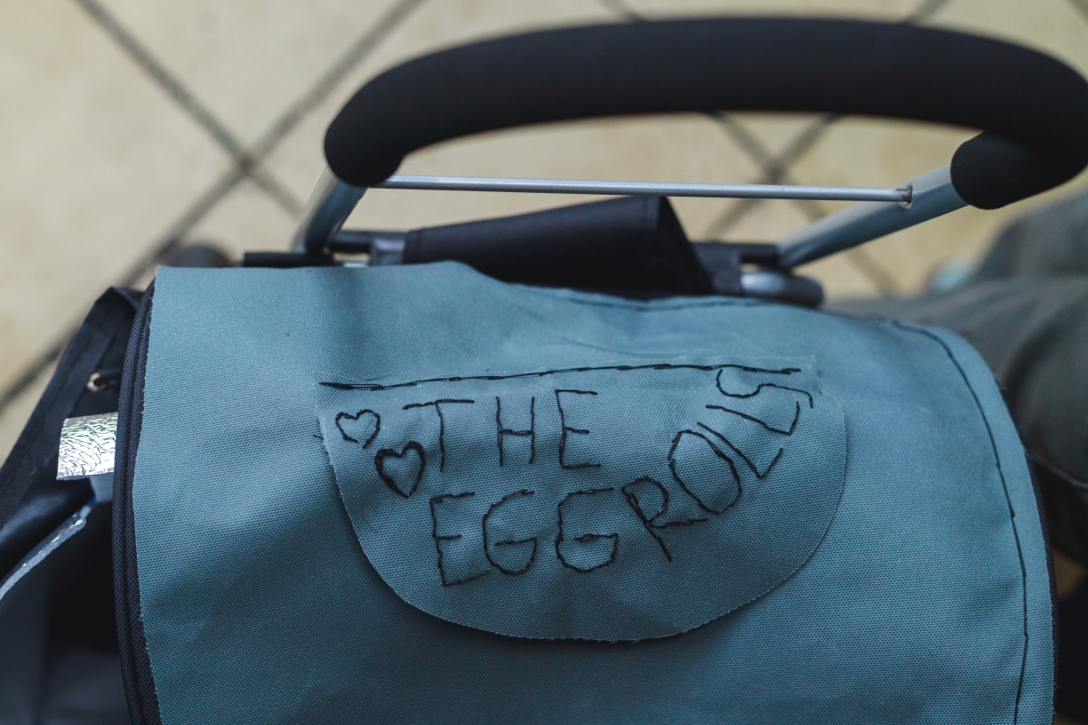 A bag embroidered with hearts and "Eggrolls"