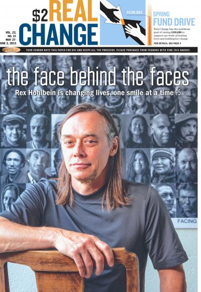 Rex Hohlbein, founder of Facing Homelessness and Homeless in Seattle, sits in front of his portraits of homeless men and women adorning his studio wall.