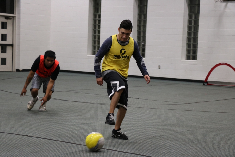 Street Soccer supports their players off the field is by pairing up players with volunteer mentors and sometimes alumni of the program. Photo by Grace Madigan