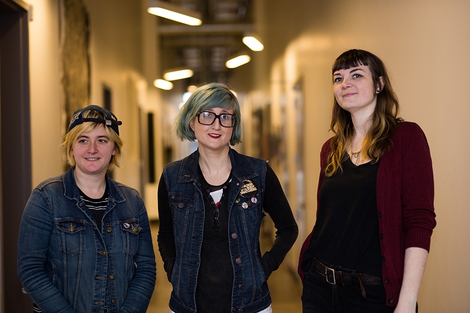 From left. bandmates Malia Alexander, Alyssa Javas and Robyn Walker didn’t consider The Dopers a political band when they formed a year ago. Now they hold fundraisers for those under threat by the Trump administration. Photo by Matthew S. Browning