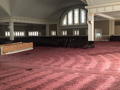 Construction crews have removed all of the pews in the great hall. Photo courtesy Town Hall