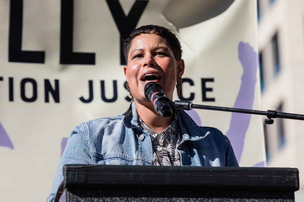 Speakers including Seattle City Council candidate Nikkita Oliver took to the stage at the Rally for Abortion Justice at Westlake Plaza.