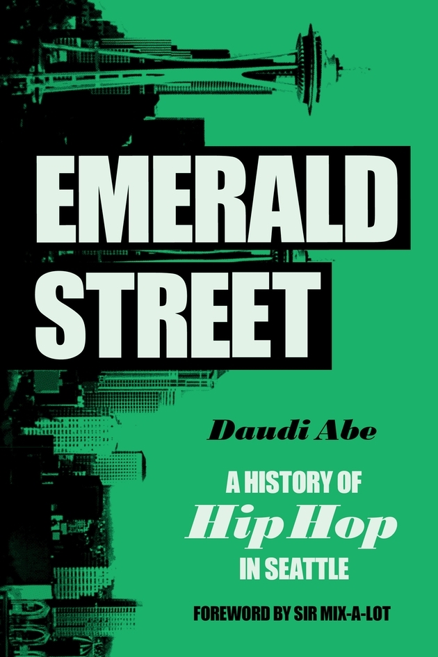 Cover of book "Emerald Street" by Daudi Abe, showing green background with image of Seattle skyline turned on its side