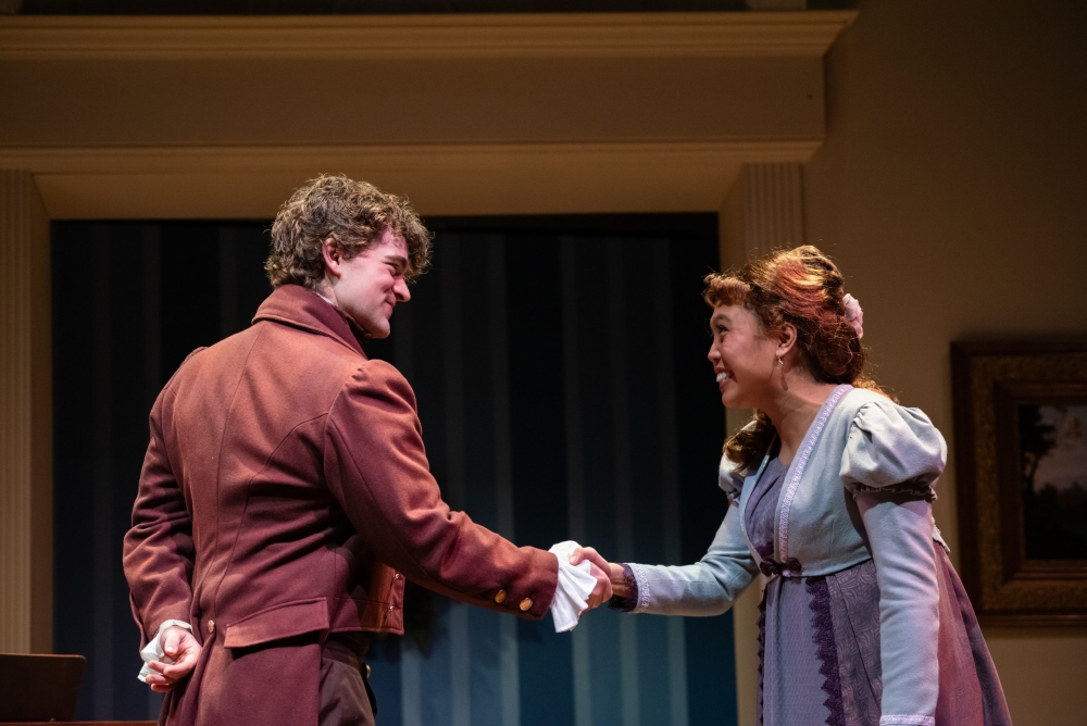 Jeremy Steckler and Ays Garcia in "Georgiana and Kitty: Christmas at Pemberley" at Taproot Theatre.